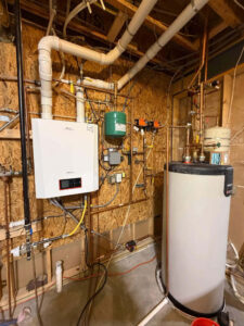 Wall-mounted boiler and indirect water heater repiped by Balance Point Heating, Cooling & Plumbing in Fort Collins