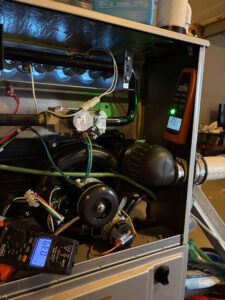 Furnace inducer motor replaced by Balance Point Heating, Cooling & Plumbing in Fort Collins, with a CO meter reading 0 ppm