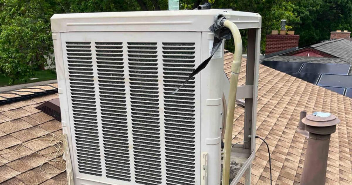 Rooftop evaporative cooler on a Fort Collins home served by Balance Point Heating, Cooling & Plumbing