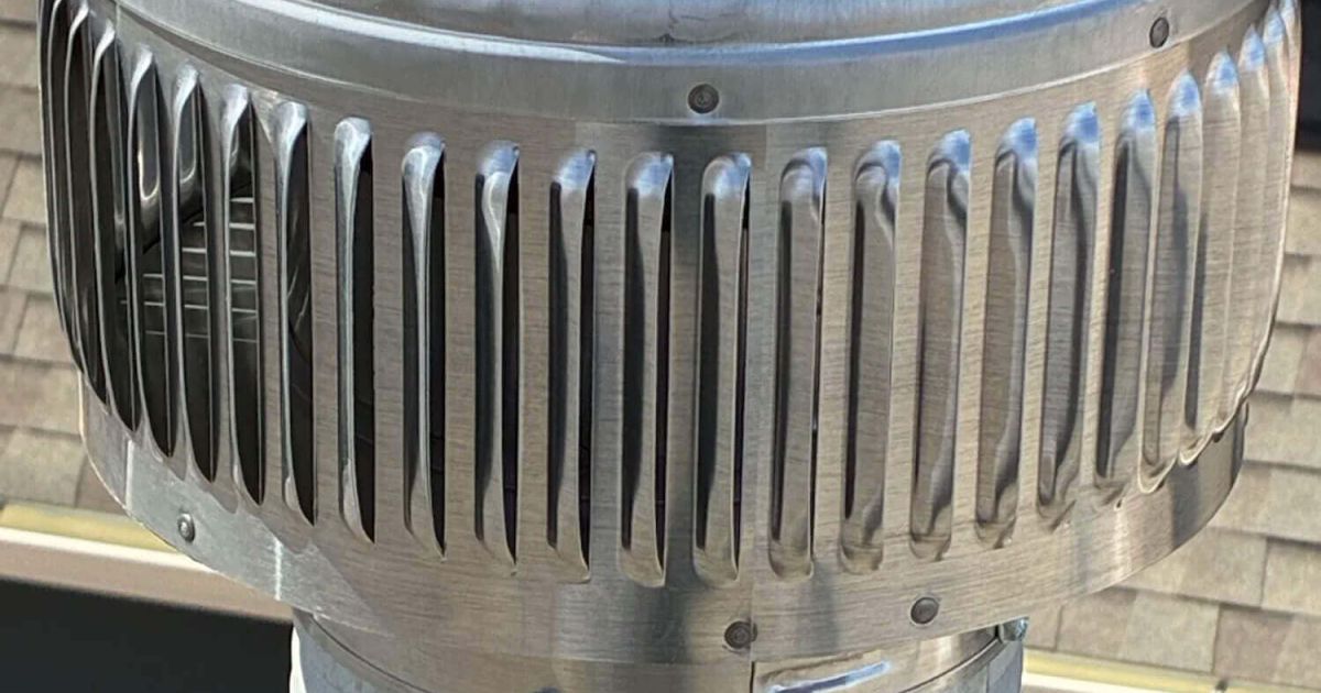 Furnace flue exhaust cap on the roof of a Fort Collins home served by Balance Point Heating, Cooling & Plumbing